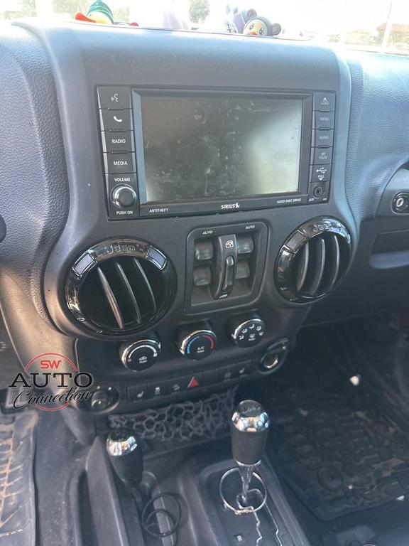 used 2012 Jeep Wrangler Unlimited car, priced at $15,911