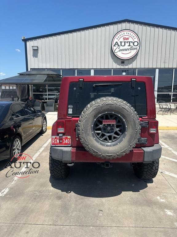 used 2012 Jeep Wrangler Unlimited car, priced at $15,911