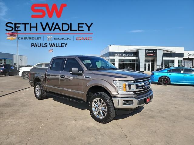 used 2018 Ford F-150 car, priced at $23,414