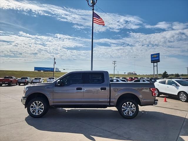 used 2018 Ford F-150 car, priced at $23,414