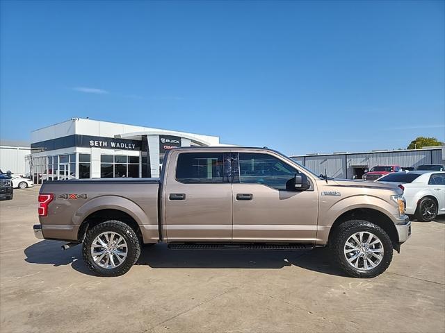 used 2018 Ford F-150 car, priced at $23,414