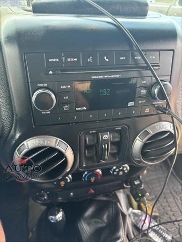 used 2015 Jeep Wrangler Unlimited car, priced at $12,518
