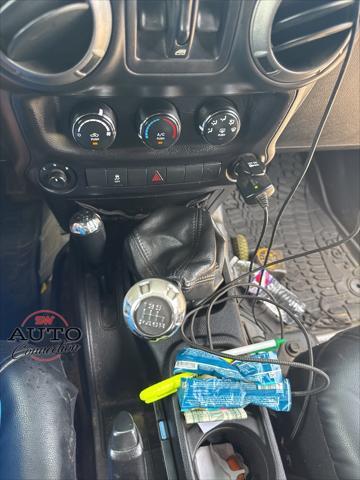 used 2015 Jeep Wrangler Unlimited car, priced at $12,518