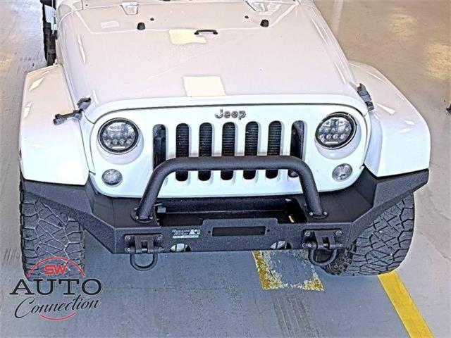used 2014 Jeep Wrangler Unlimited car, priced at $18,906