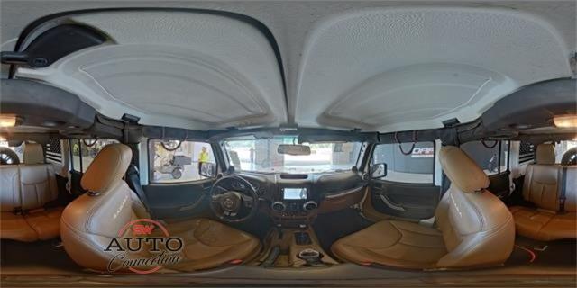 used 2014 Jeep Wrangler Unlimited car, priced at $18,906
