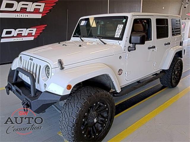 used 2014 Jeep Wrangler Unlimited car, priced at $18,906