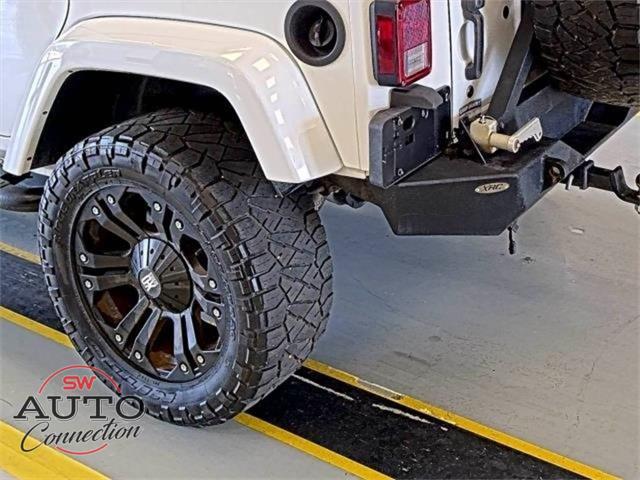 used 2014 Jeep Wrangler Unlimited car, priced at $18,906