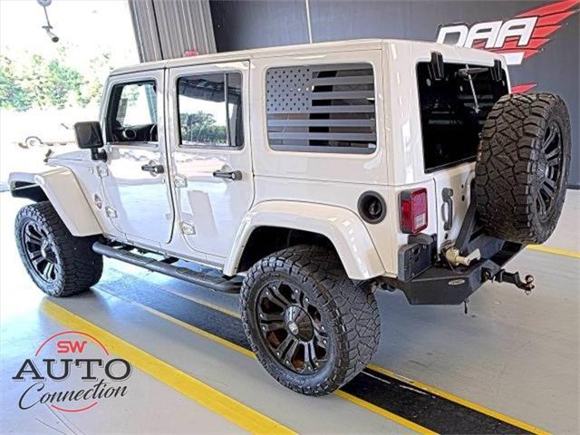used 2014 Jeep Wrangler Unlimited car, priced at $18,906