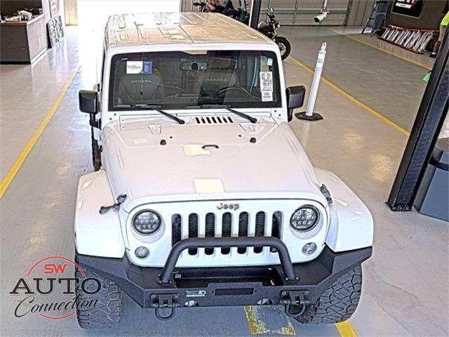 used 2014 Jeep Wrangler Unlimited car, priced at $18,906