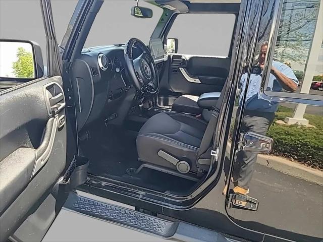 used 2015 Jeep Wrangler Unlimited car, priced at $18,475