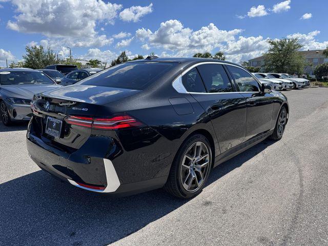 used 2024 BMW i5 car, priced at $56,241