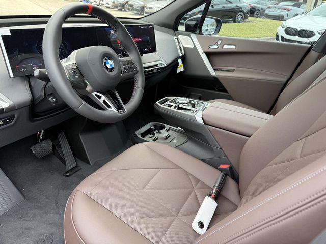 new 2025 BMW iX car, priced at $117,225