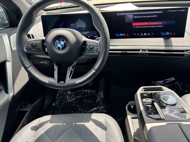 used 2025 BMW iX car, priced at $97,591