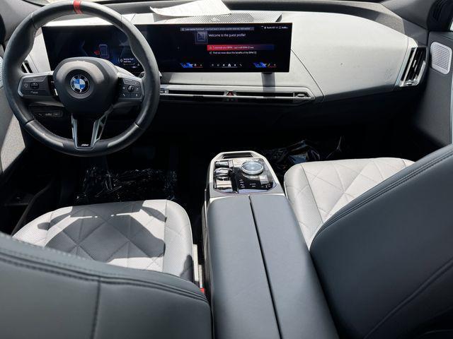 used 2025 BMW iX car, priced at $97,591