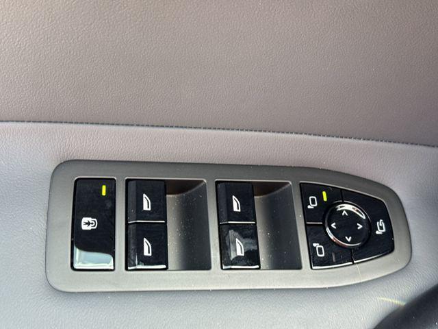 used 2025 BMW iX car, priced at $97,591