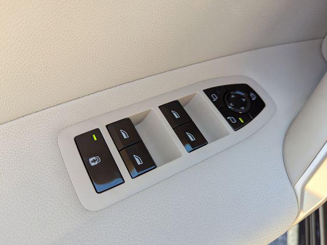 used 2025 BMW iX car, priced at $73,891