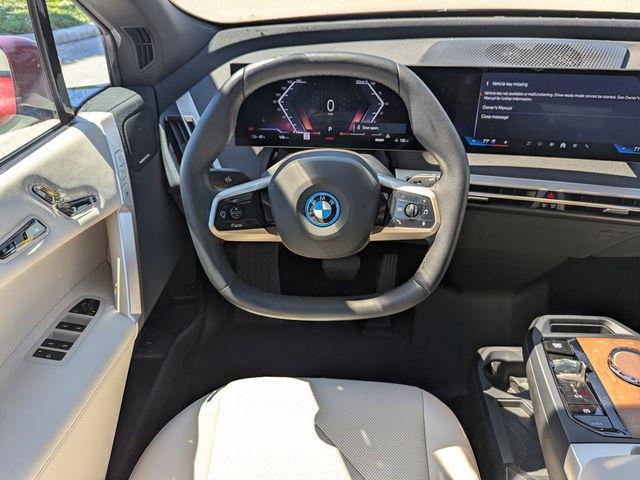 used 2025 BMW iX car, priced at $73,891