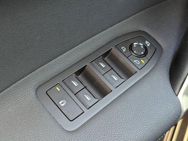 used 2024 BMW iX car, priced at $53,352