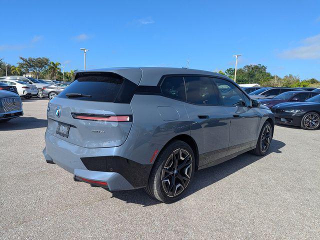 used 2024 BMW iX car, priced at $53,352