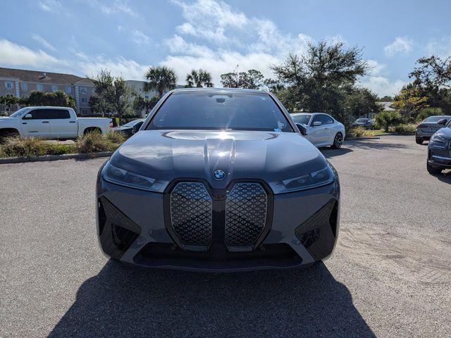 used 2024 BMW iX car, priced at $53,352