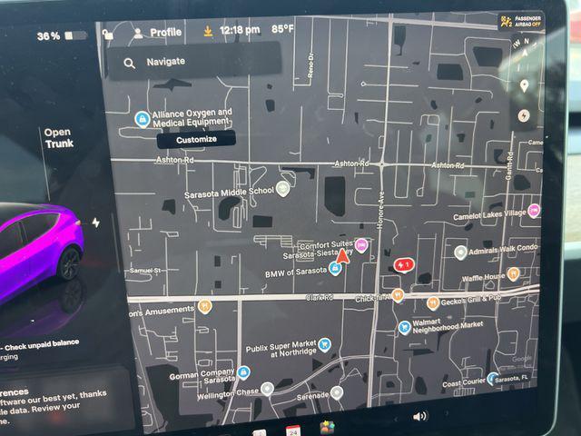 used 2024 Tesla Model Y car, priced at $34,369