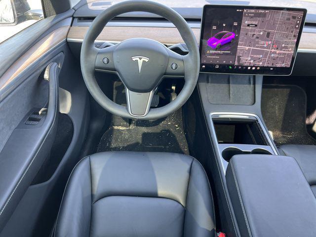 used 2024 Tesla Model Y car, priced at $34,369