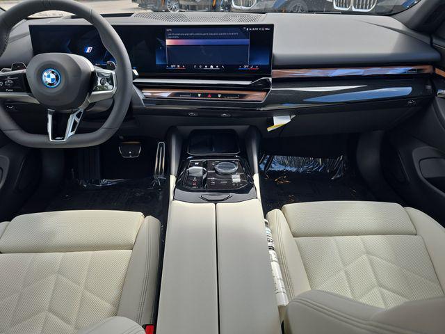 new 2026 BMW 550e car, priced at $82,450