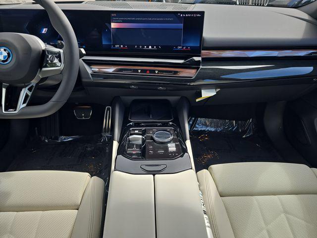new 2026 BMW 550e car, priced at $82,450