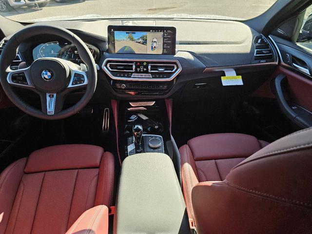 used 2025 BMW X4 car, priced at $60,893