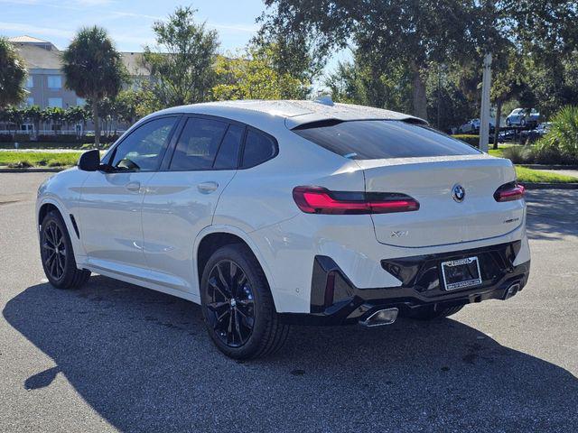 used 2025 BMW X4 car, priced at $60,893