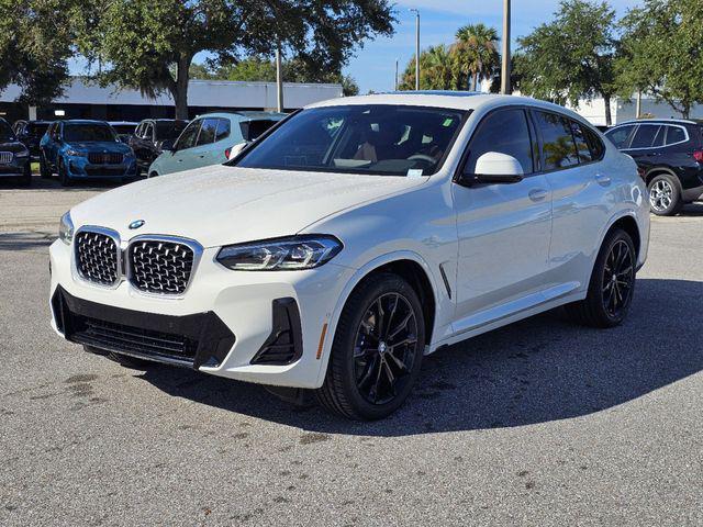 used 2025 BMW X4 car, priced at $60,893