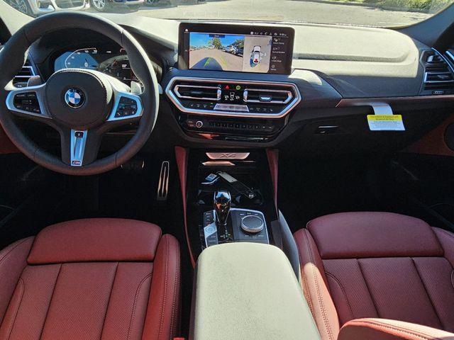 used 2025 BMW X4 car, priced at $60,893