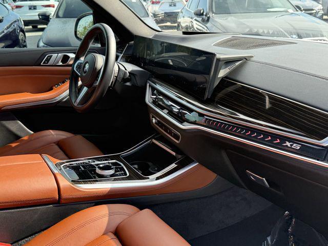 used 2024 BMW X5 car, priced at $58,353