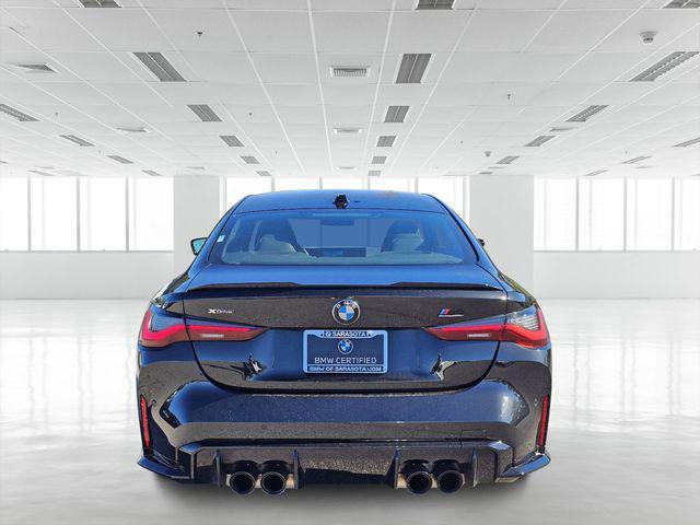 used 2024 BMW M4 car, priced at $83,894