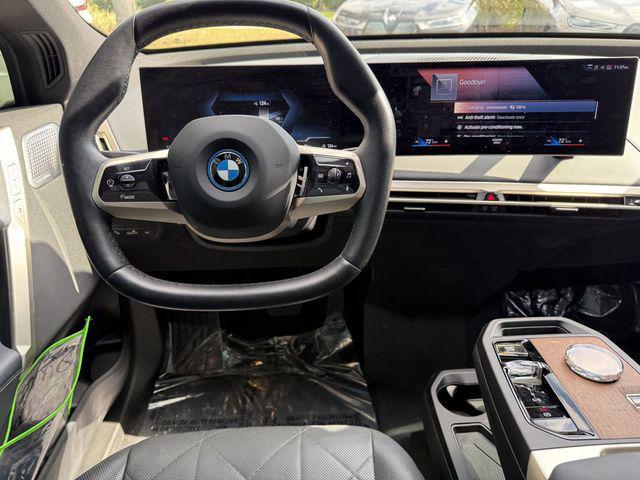 used 2023 BMW iX car, priced at $63,406