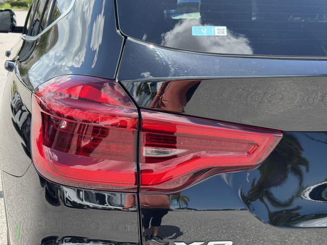 used 2021 BMW X3 PHEV car, priced at $31,641