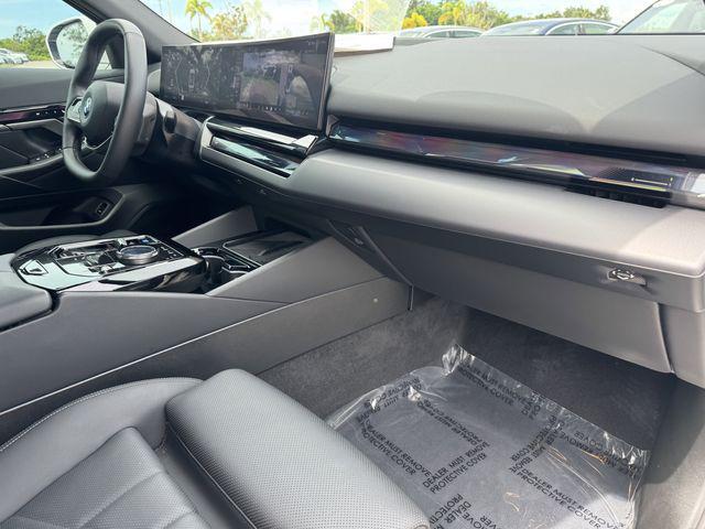used 2024 BMW i5 car, priced at $45,313