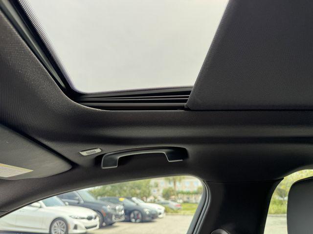 used 2024 BMW i5 car, priced at $45,313