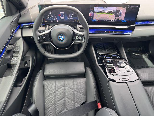 used 2024 BMW i5 car, priced at $45,313