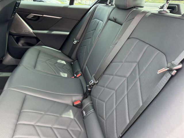 used 2024 BMW i5 car, priced at $45,313