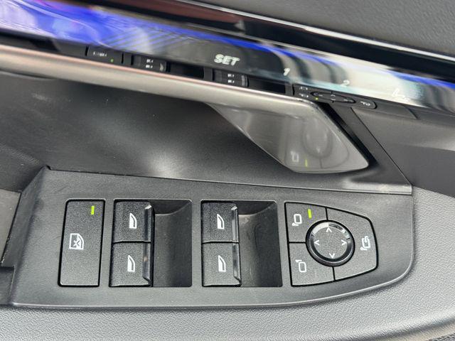 used 2024 BMW i5 car, priced at $45,313