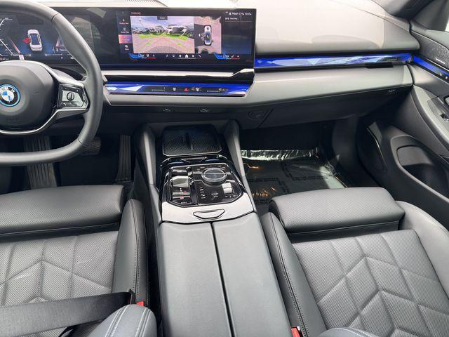 used 2024 BMW i5 car, priced at $45,313