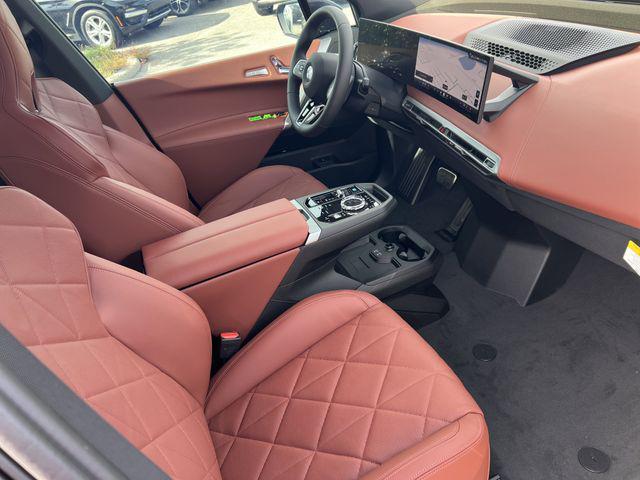 new 2026 BMW iX car, priced at $106,825