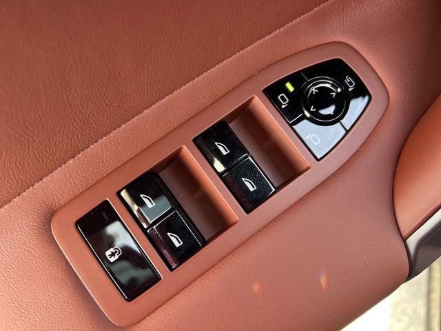 new 2026 BMW iX car, priced at $106,825