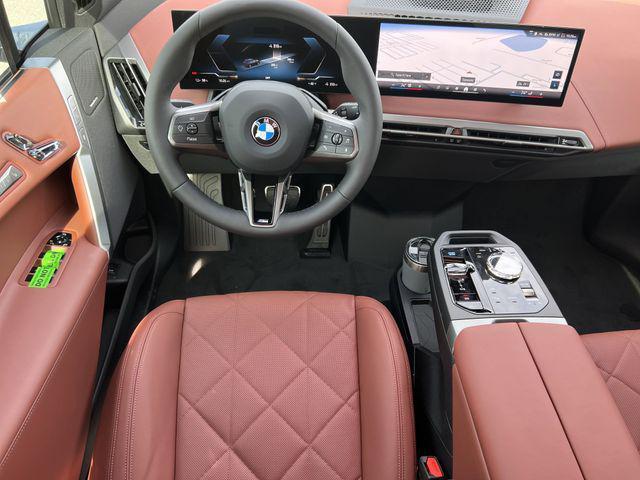 new 2026 BMW iX car, priced at $106,825