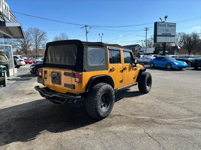 used 2014 Jeep Wrangler Unlimited car, priced at $12,990