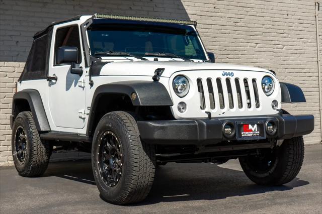 used 2015 Jeep Wrangler car, priced at $19,399