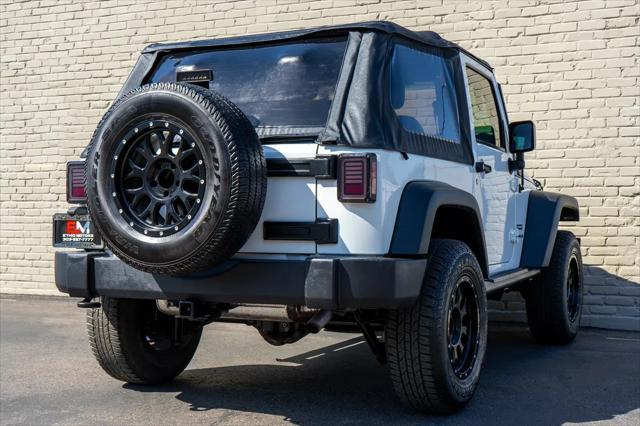 used 2015 Jeep Wrangler car, priced at $19,399