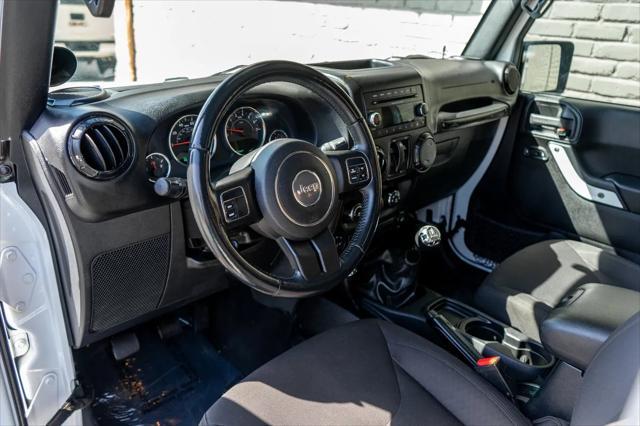 used 2015 Jeep Wrangler car, priced at $19,399