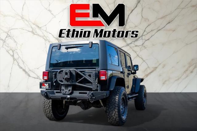used 2012 Jeep Wrangler Unlimited car, priced at $17,999